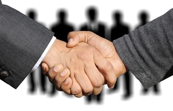 Buisinessman shaking customer's hand