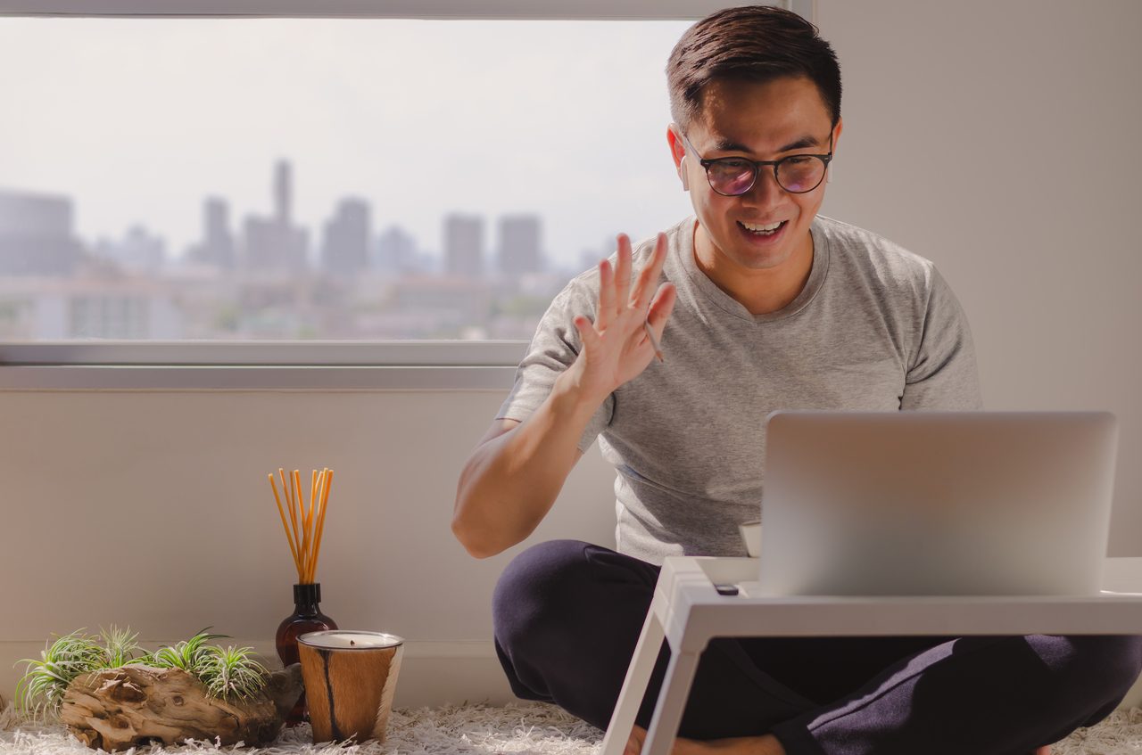 A Boss On A Video Call With Employees