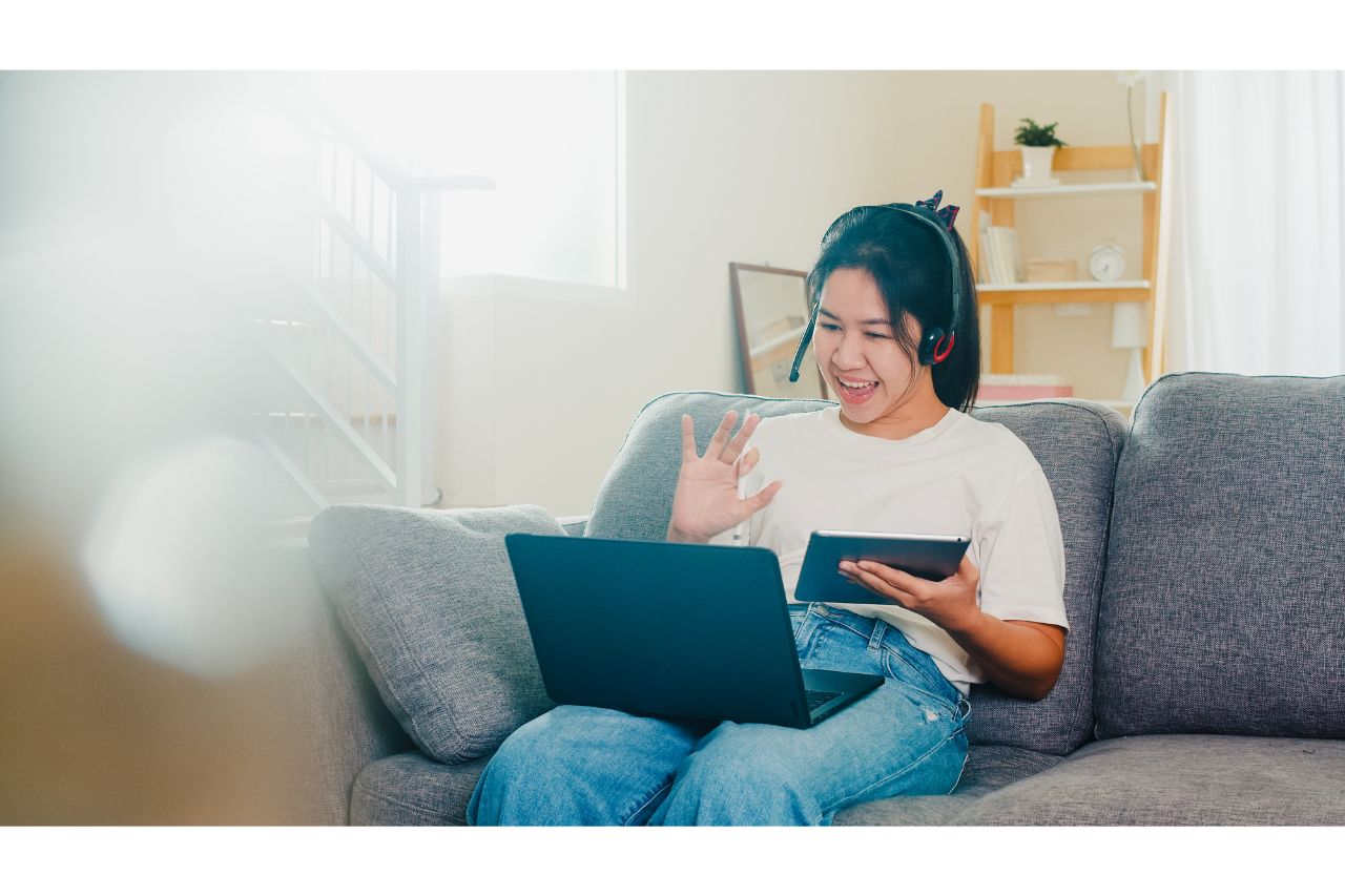 An employee talking to her boss while working from home